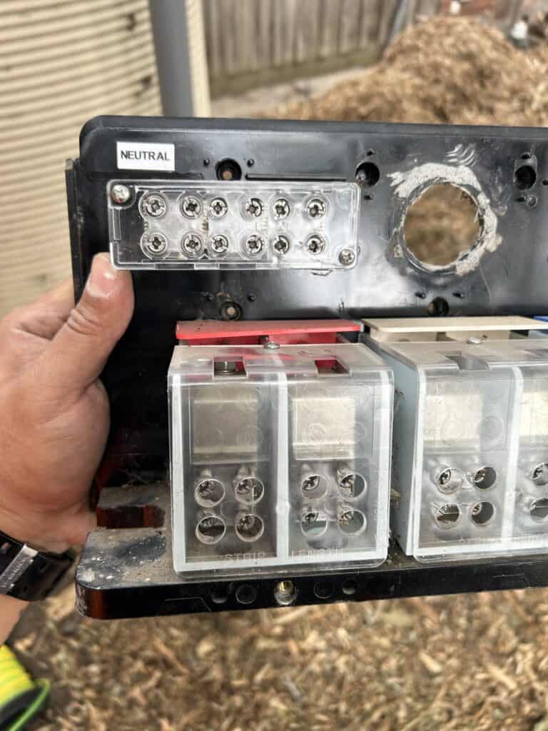 Electrical overhead box showing the inside of the point of attachment.