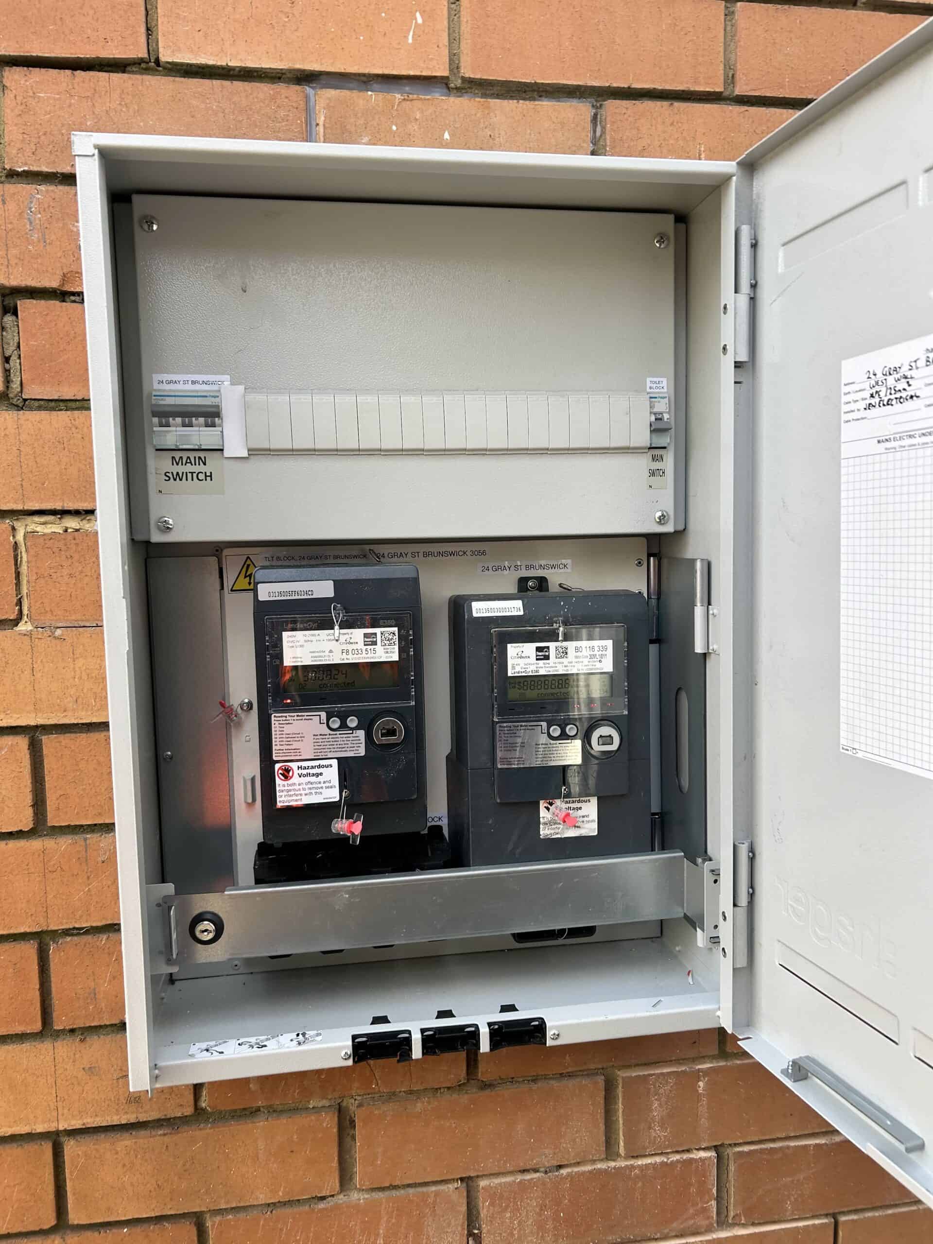Modern three phase electrical switchboard showing circuit breakers and safety switches after professional upgrade installation