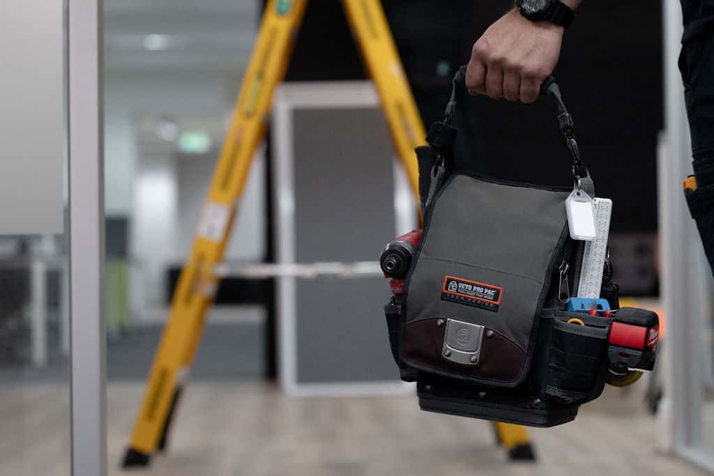Local electrician in Melbourne conducting an electrical inspection.
